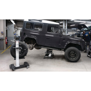 Special Wheel Lift With Winch lifting a large 4x4 wheel